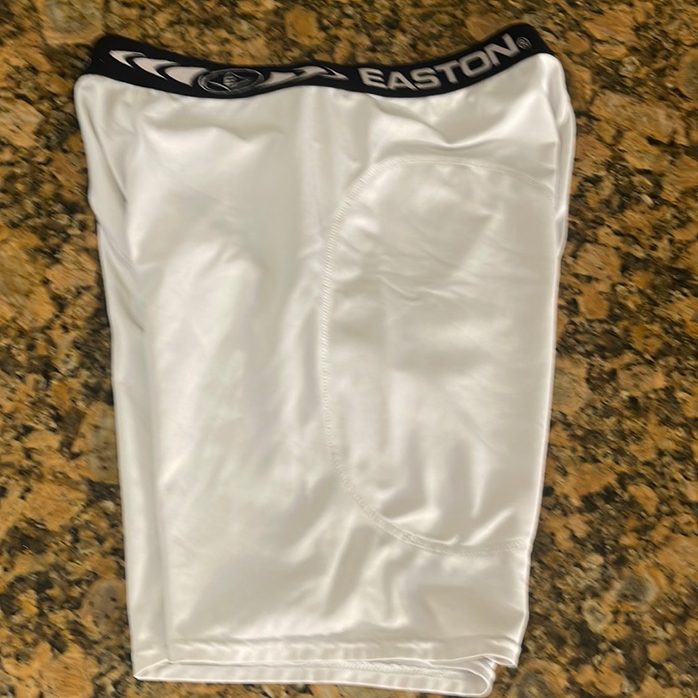 Sliding shorts and cup holder